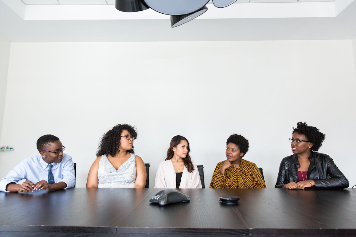 Diverse professionals communicating in a meeting